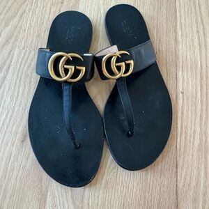Gucci Black and Gold Sandals with Iconic GG Logo